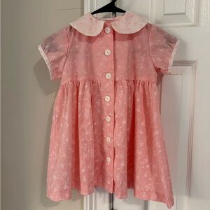 Toddlers vintage pink bow  Button-Up babydoll dress hand sewn from the 1970s